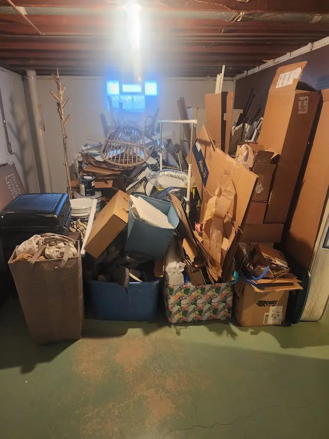 Roll-off dumpster container at job site for 15 Yard Dumpster Rental in Robinson